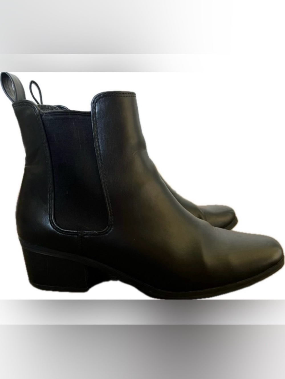 Black leather pull on ankle boots with elastic panels. Womens Size 8.5